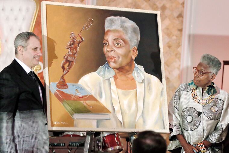 Philadelphia Legacy founder Steve Satell (left) unveils a portrait of Tina Sloan Green as Green looks on during the third annual Philadelphia Legacy Award Gala in September.