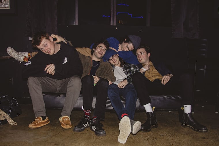 The Philadelphia rock band RFA, who put out their excellent second album Late To The Party just as 2020 came to a close. From left to right: Alec Powell, Christian Turzo, Will Loftus, Dan Cousart. Brendan McHale is horizontal, on top of the others.