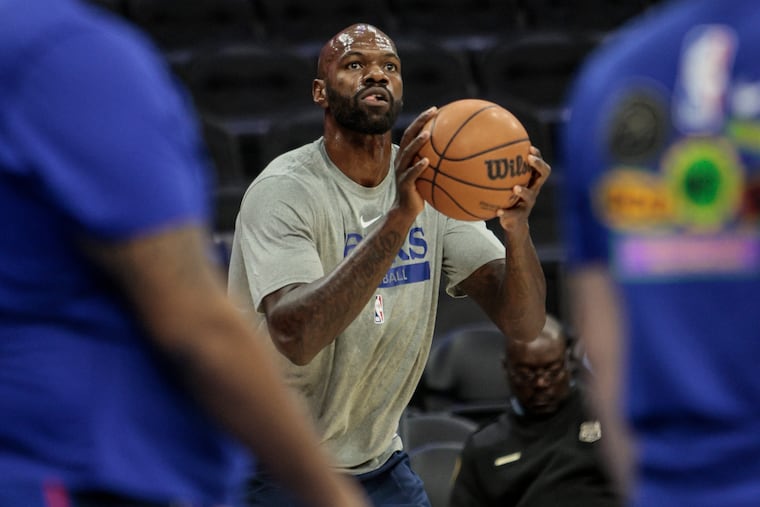 Sixers' Dewayne Dedmon warms up before the game with the Cavaliers at the Wells Fargo Center on Feb. 15.