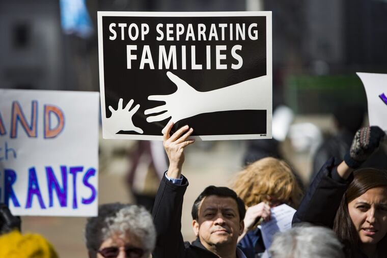 A demonstrator at a rally for immigrants in Center City Monday.