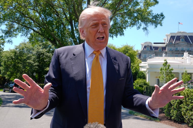 President Donald Trump speaks with reporters on Tuesday before leaving for a trip to China.