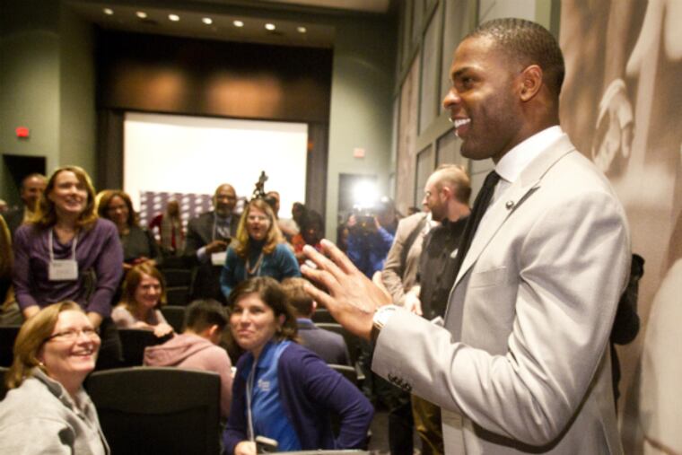 DeMarco Murray greets members of a local Habitat for Humanity group that happened to be at the NovaCare Complex.