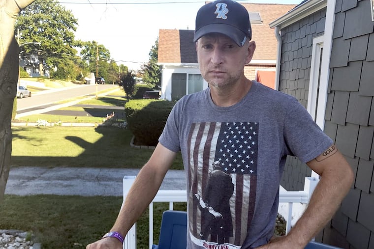 Steve Gold, 42, stands outside his Wilmington home. Gold was at the country music concert in Las Vegas last week where a gunman opened fire from the 32nd floor of the nearby Mandalay Bay hotel.