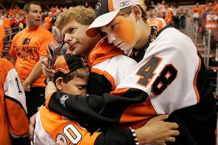 Fans were stunned by the Flyers' season-ending 4-3 overtime loss to the Blackhawks. (Michael Bryant/Staff Photographer)