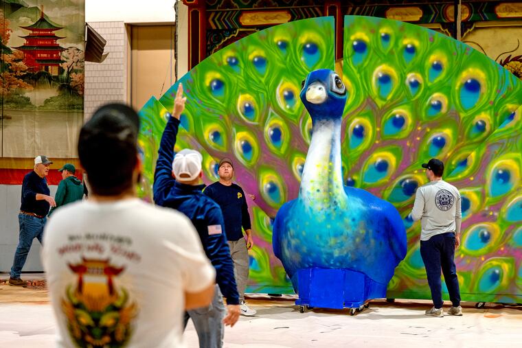 Members of Bill McIntyre’s Shooting Stars Fancy Brigade run through their stagings, in the Convention Center Monday, Dec. 30, 2024. Their theme is “Legends of the Secret Scrolls.”