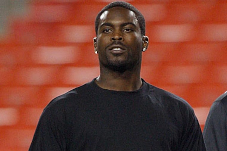 Michel Vick's current legal situation could put his future with the Eagles in jeopardy. (Pablo Martinez Monsivais/AP)