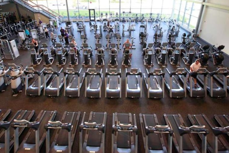 Over a hundred exercise machines are available at the new YMCA which opened in Havertown Tuesday, October 1, 2013. ( DAVID SWANSON / Staff Photographer )