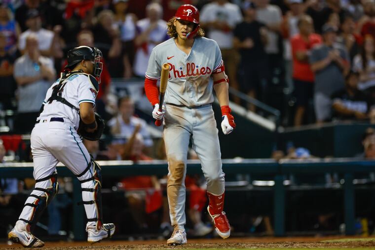 Alec Bohm strikes out looking to end the top of the ninth inning in Game 3 of the NLCS against the Diamondbacks on Thursday in Phoenix. The Phillies went on to lose, 2-1.