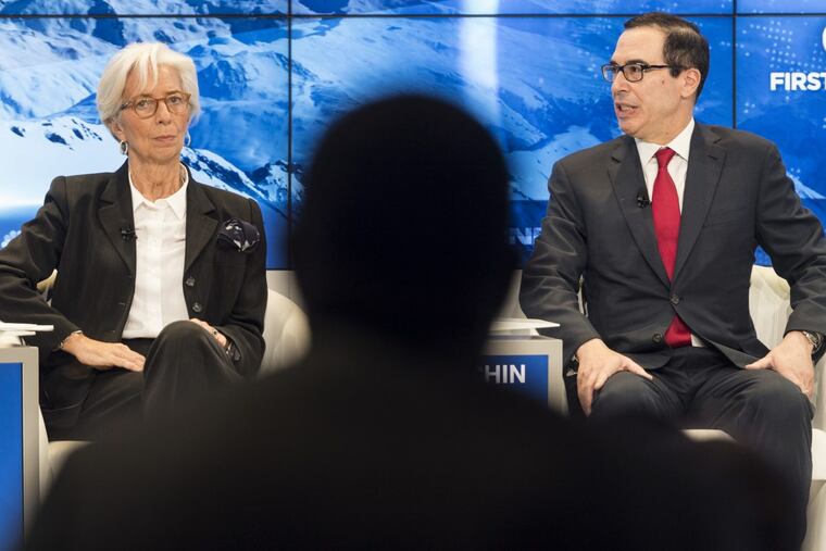 Christine Lagarde, Managing Director of the International Monetary Fund IMF (left) and Steven Mnuchin, Secretary of the Treasury of the United States, attend a panel session during the 48th Annual Meeting of the World Economic Forum in Davos, Switzerland.
