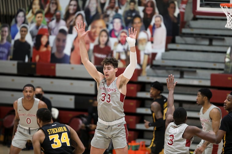 Saint Joseph's guard Taylor Funk scored 29 points in Sunday's 85-77 loss to Rhode Island.