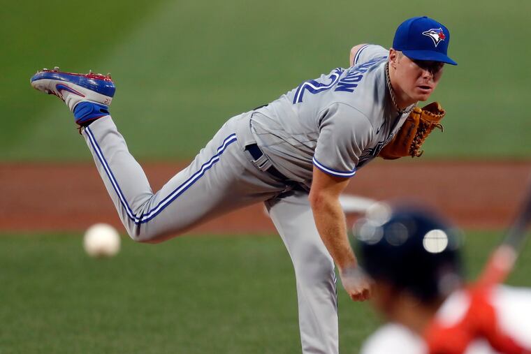 Right-hander Chase Anderson will compete in spring training for a spot in the Phillies' starting rotation.