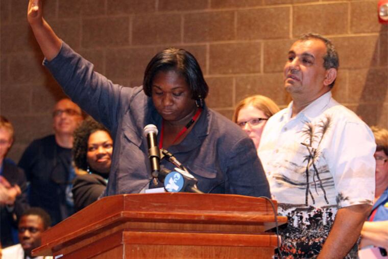 Teresa Powell and Abdallah Hawa, director of Technology at the Coatesville School District and the man who found the text messages on the Superintendents phone, at a school board meeting. They first saw the texts.