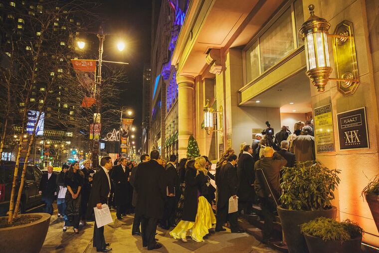 Scenes like this will not take place Saturday night -- the Academy Ball was canceled because of the threat of heavy snowfall. In this photo, a procession of guests enter the Bellevue for the 2015 Academy Ball.