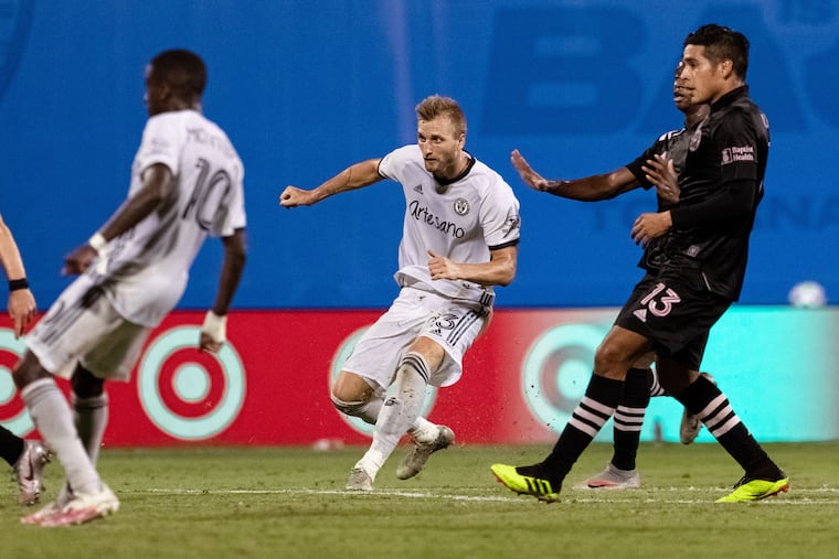 Union forward Kacper Przybylko (second from right) watches his shot go in for the game-winning goal in the second half against Inter Miami.