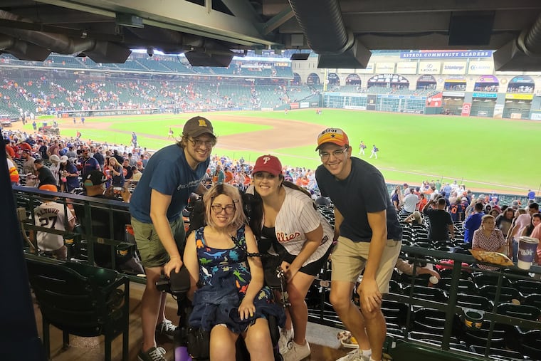 From L-R, Casey Crisman-Cox, Sarah Sheffner, Erin Gough and Erik Peterson at Minute Maid Park in Houston in September. Gough, a Harrisburg native and lifelong Phillies fan, is navigating rooting for the Phils in her new hometown. She told Peterson he can't keep his Astros hat at home during the World Series.
