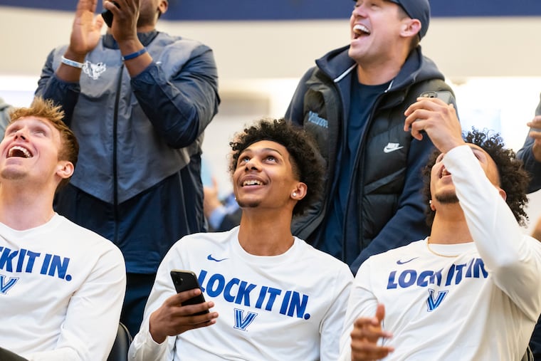 Villanova cheers as its name gets called for a spot in March Madness on Selection Sunday.