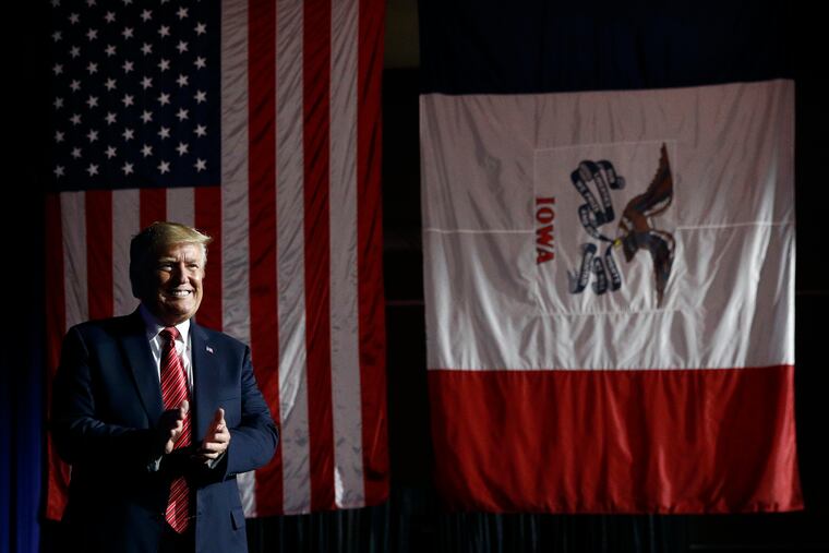 In this June 11, 2019, photo, President Donald Trump arrives to speak at the Republican Party of Iowa's annual dinner in West Des Moines, Iowa, Tuesday. Few states have changed politically with the head-snapping speed of Iowa.