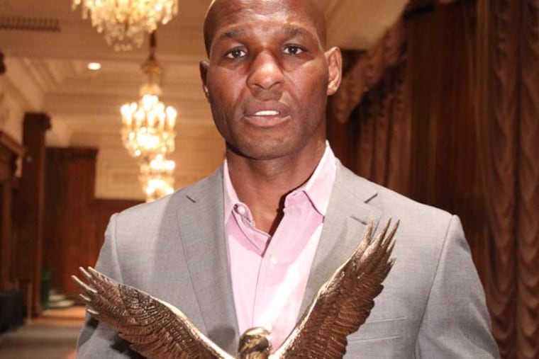 Bernard Hopkins, shown here with his Wanamaker Award, is poised to make another title defense. (Charles Fox/Staff Photographer)