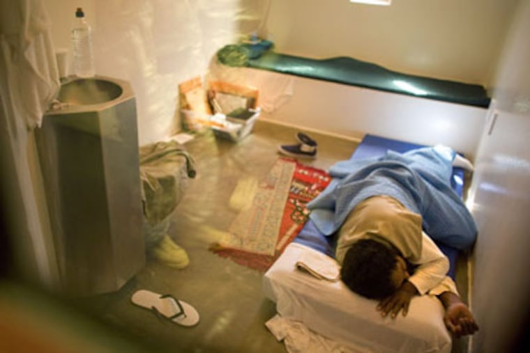 President Barack Obama signed orders on Thursday to close the detention center at Guantanamo Bay, Cuba, but Daily News columnist Christine Flowers hopes it stays open. (AP Photo / Brennan Linsley, File)