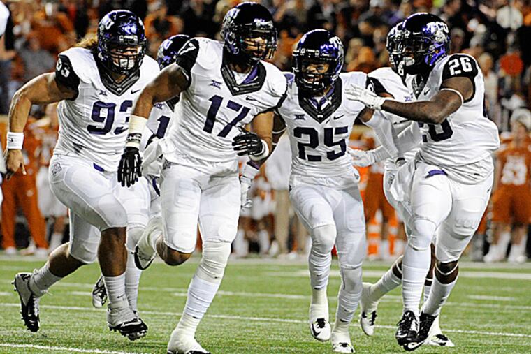 TCU safety Sam Carter celebrates with teammates. (Brendan Maloney/USA Today Sports)