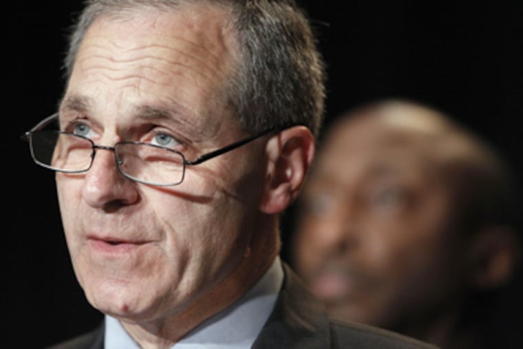Former FBI director Louis Freeh speaks after it was announced by Ken Frazier, obscured at rear right, chairman of the Penn State University special committee, that Freeh will lead an independent investigation into allegations of child abuse by a former Penn State employee, in Philadelphia. (AP Photo/Alex Brandon, File)