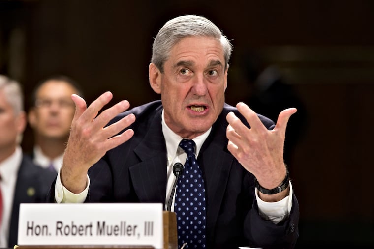 FBI Director Robert Mueller testifies on Capitol Hill in Washington, Wednesday, June 19, 2013.