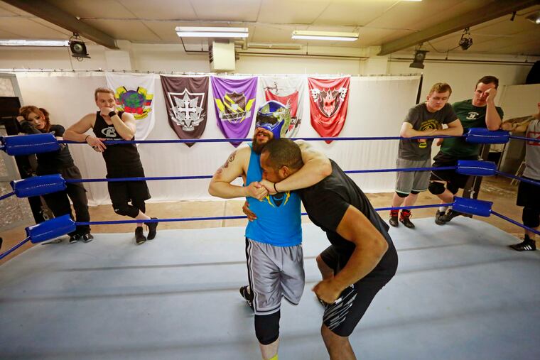 Ophidian the Cobra has Warren Barksdale in a headlock at the Wrestle Factory Monday April 11, 2016. The Wrestle Factory is the public-facing school associated with Chikara, a professional wrestling promotion that shut down last month following a wave of abuse allegations.