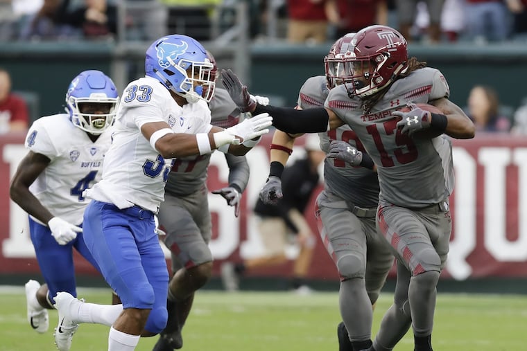 Temple wide receiver Isaiah Wright runs past a Buffalo player early in the season.