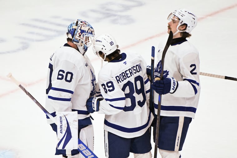 Goaltender Joseph Woll (left) and defenseman Simon Benoit (right) were acquired by the Flyers on Tuesday.