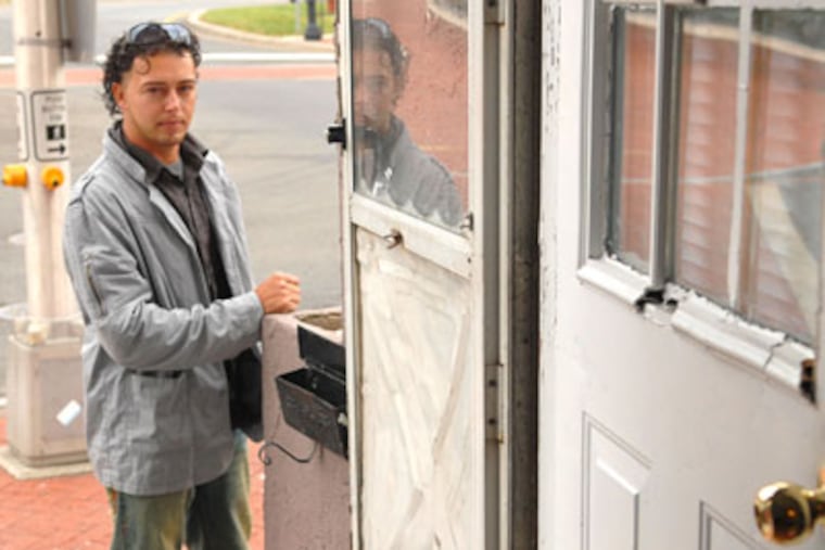 "I can't continue here," Francisco "Frank" Santos, at his Trenton apartment, said before returning to Brazil. (Peter Tobia / Staff Photographer)