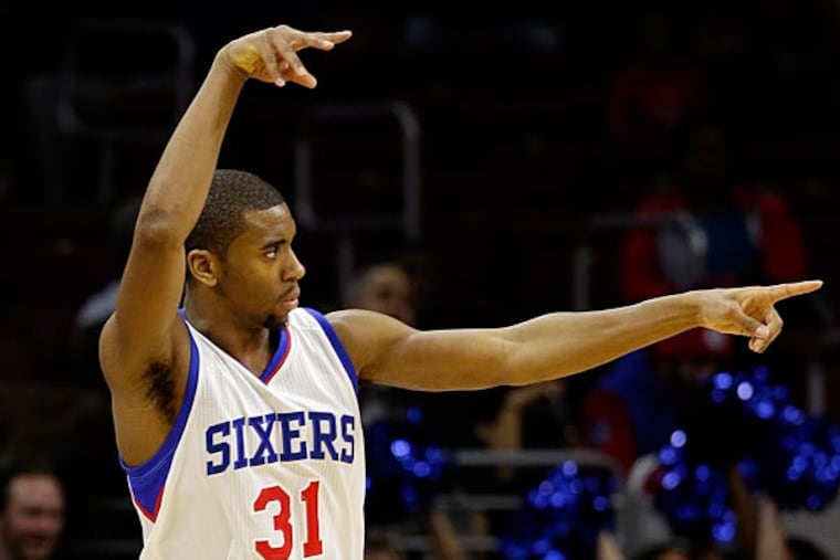 Philadelphia 76ers' Hollis Thompson reacts after scoring a 3-pointer during the first half of an NBA basketball game against the Denver Nuggets, Tuesday, Feb. 3, 2015, in Philadelphia. Philadelphia won 105-98. (Matt Slocum/AP)