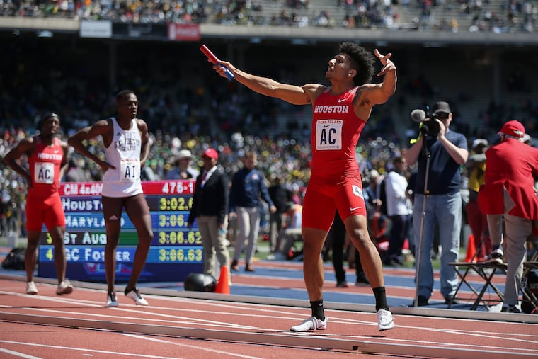 Houston's Obi Igbokwe celebrates after crossing the finish line to help his team win the college men's 4x400 championship during the 125th annual Penn Relays at Franklin Field in Philadelphia on Saturday, April 27, 2019. Houston finished in 3:02.61.