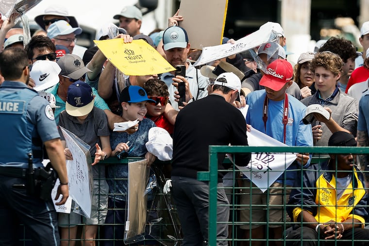Fans gather for autographs from Rory McIlroy during the pro-am event at the Truist Championship on Wednesday.