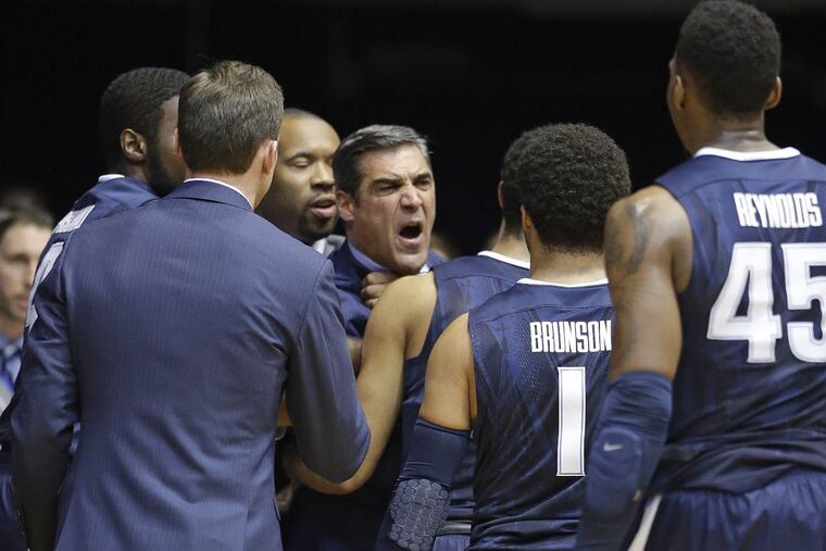 Villanova coach Jay Wright is restrained during the Wildcats' first loss of the season at Butler. "It’s hard to get over losses.," he said of the setback.
