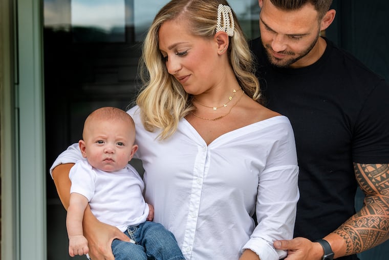 Charles and Amanda Sigwart with their son Mason at their home in Marlton. Amanda gave birth by emergency C-section in late March, just as hospitals were changing their policies to protect against the coronavirus.