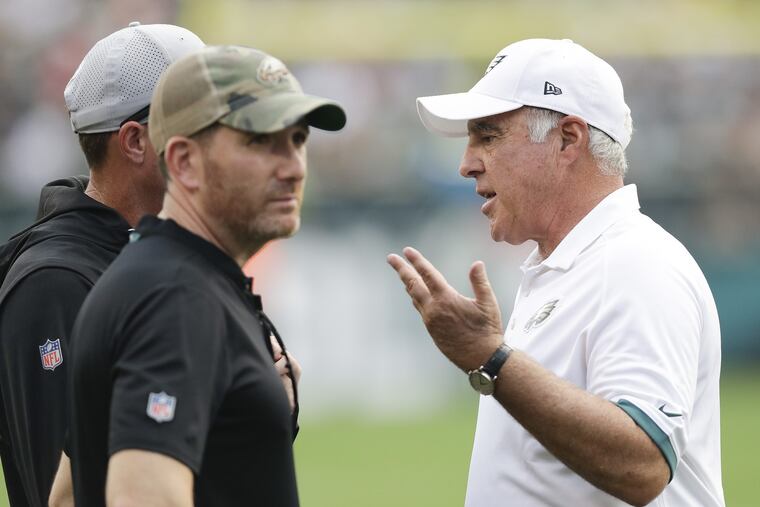 Eagles Chairman and Chief Executive Officer Jeffrey Lurie talks to football operations vice president Howie Roseman during public practice at Lincoln Financial Field in South Philadelphia on Sunday, August 5, 2018. YONG KIM / Staff Photographer