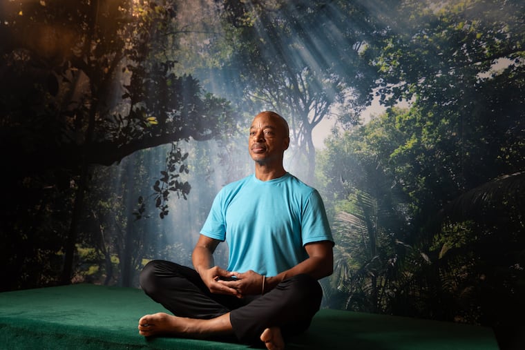 Yoga instructor John Wylie at the yoga studio inside AFC Fitness Bala Cynwyd.