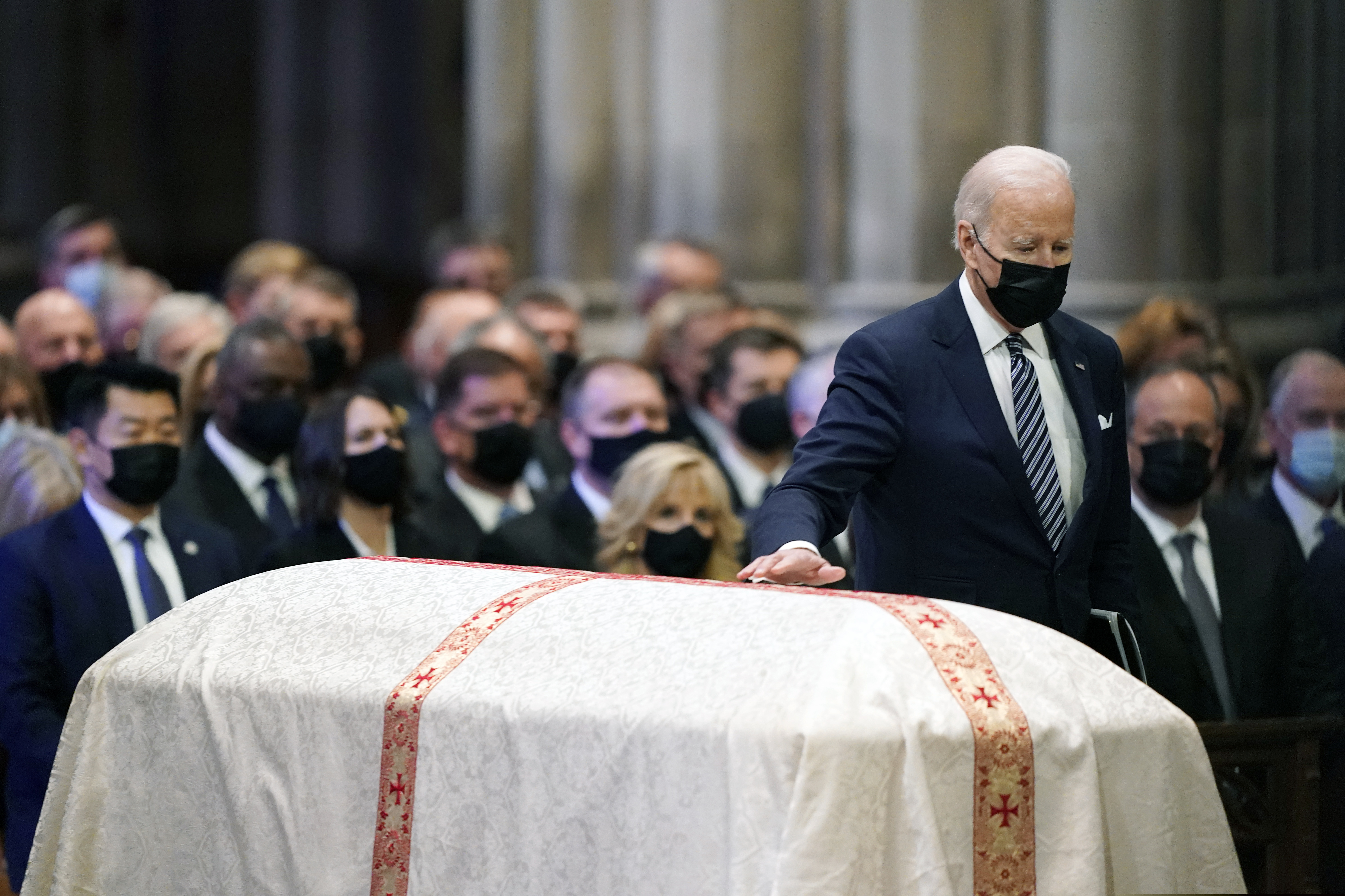 President Joe Biden walks to speak during the funeral of former Sen. Bob Dole of Kansas, at the Washington National Cathedral, Friday, Dec. 10, 2021, in Washington.