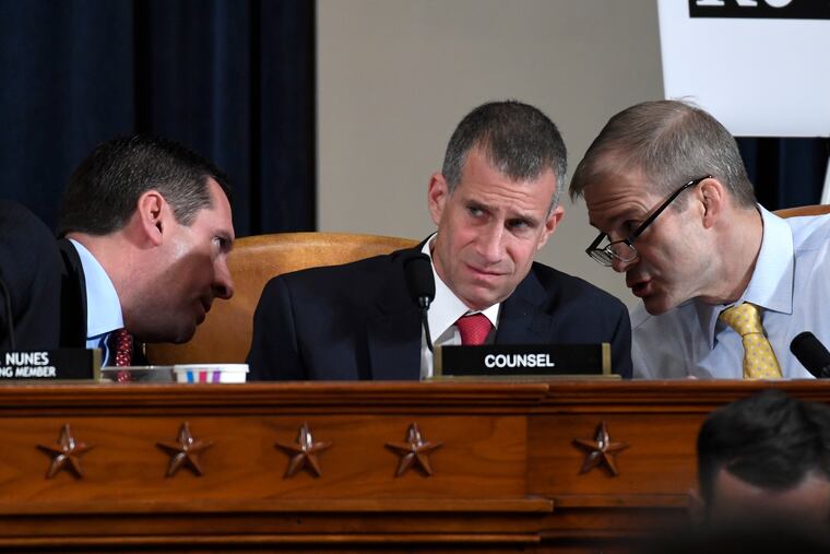 Ranking member Rep. Devin Nunes (R., Calif.) talks to Rep. Jim Jordan (R., Ohio), right, as Steve Castor, Republican staff attorney for the House Oversight Committee, center, listens at a House Intelligence Committee hearing.