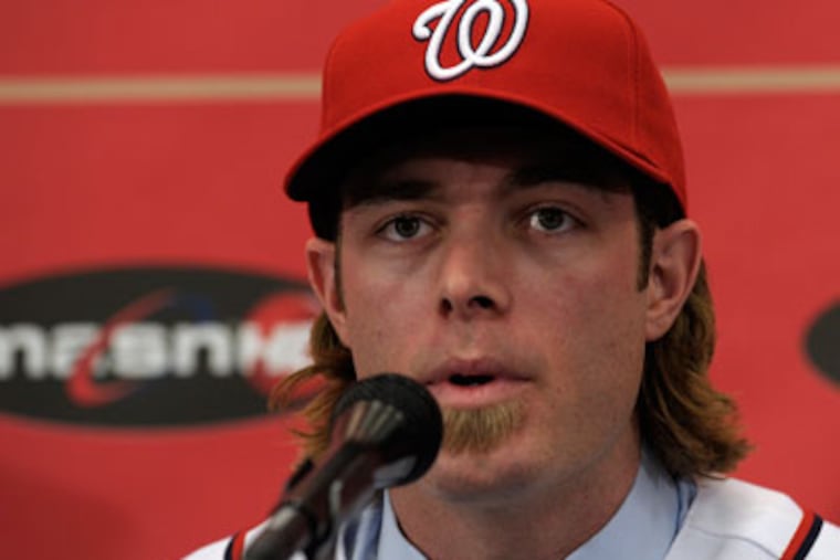 Jayson Werth was introduced as a member of the Nationals Wednesday. (AP Photo/Susan Walsh)