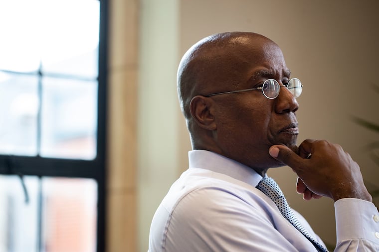 Jason Wingard, then-Temple University president, speaks with a reporter in his office in Sullivan Hall at Temple University on July 18, 2022.