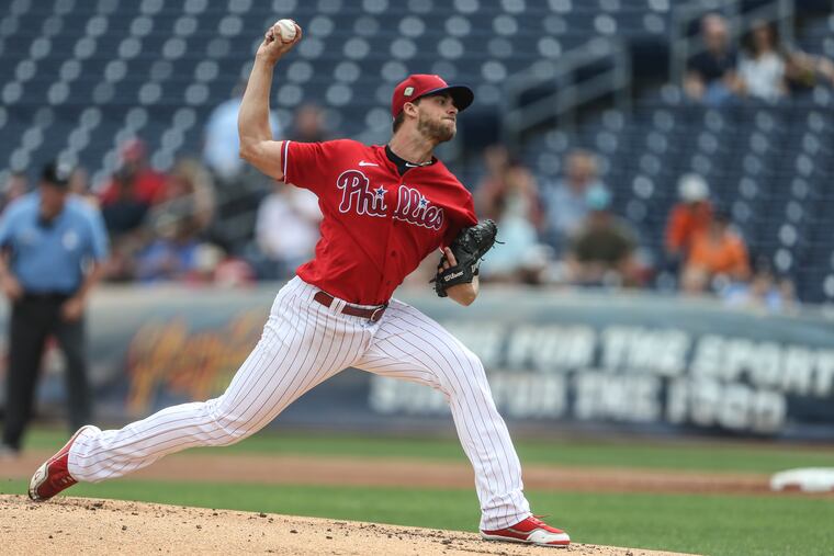 Phillies pitcher Aaron Nola throws against the Tigers on Sunday at BayCare Ballpark in Clearwater, Fla.