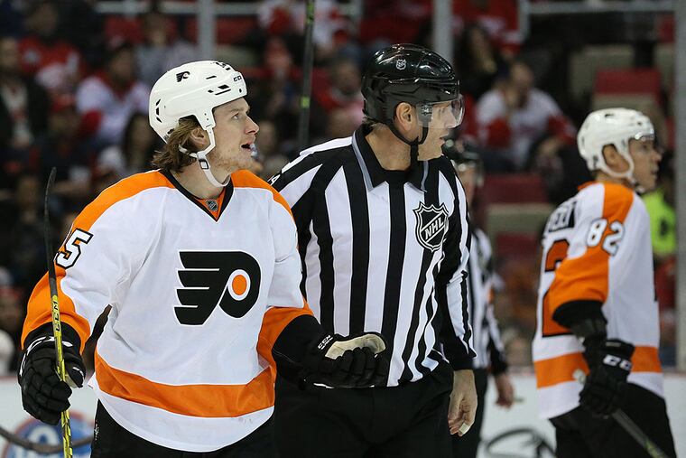 Philadelphia Flyers center Ryan White (25) reacts after being ejected from the game during the first period after being called for a 10 Minute Match Penalty for Deliberate injury Tomas Jurco (not in photo) at Joe Louis Arena.