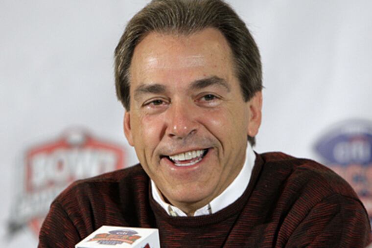 Alabama head coach Nick Saban smiles as he answers a question from the media during a news conference yesterday. (AP Photo/Jae C. Hong)