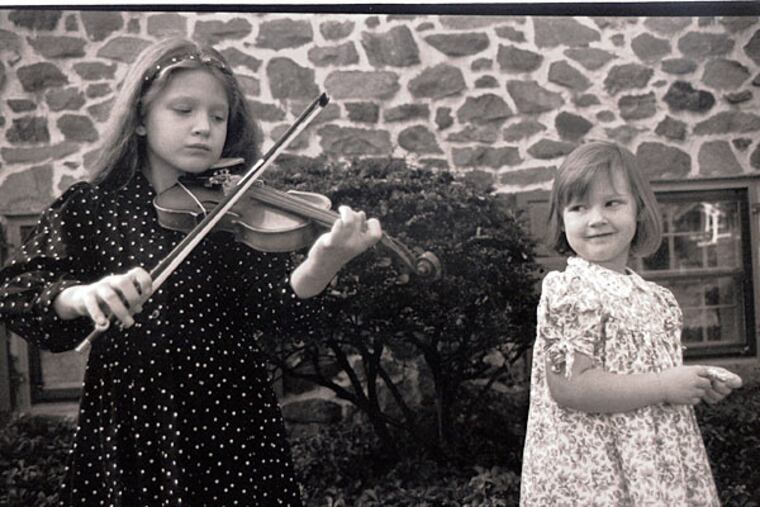 Lauren Rile Smith, at age 7; Madeline Rile Smith at age 4. 1993. Photo by Karen Rile.