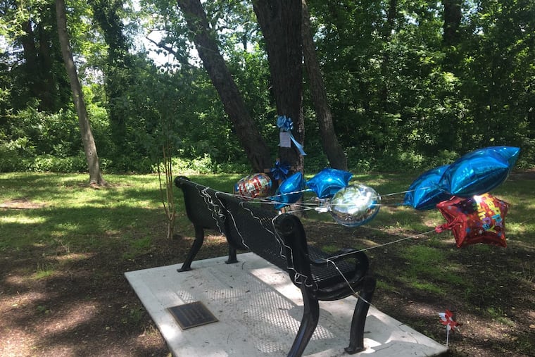 Balloons tied to a bench in the Haddon Township, N.J., woods near where Brendan Creato, 3, was found dead in October 2015 mark what would have been his fifth birthday on Thursday.