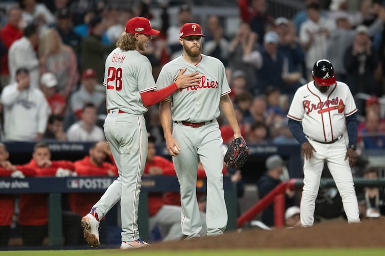 Phillies third baseman Alec Bohm encourages pitcher Zack Wheeler during the sixth inning on Wednesday.