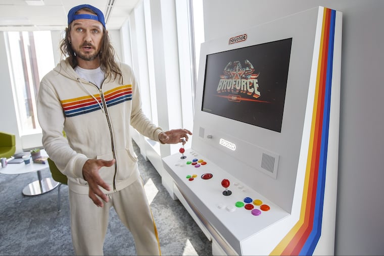 Tyler Bushnell, son of Atari founder Nolan Bushnell, has created the Polycade, right. A wall mounted game console that gives you the arcade feel in your home. He is part of the Comcast accelerator that is situated on the 48th floor of 1717 Arch Street and began on Monday. MICHAEL BRYANT / Staff Photographer