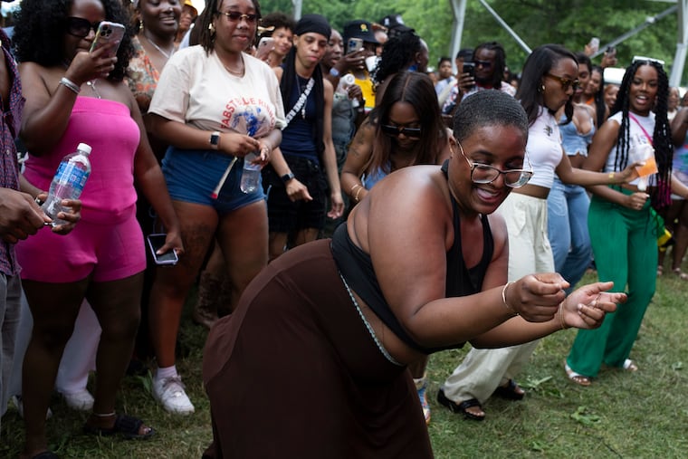 People dance at the Jerk x Jollof set at the Centennial Stage during The Roots Picnic at the Mann Center in Philadelphia on Sunday, June 2, 2024.