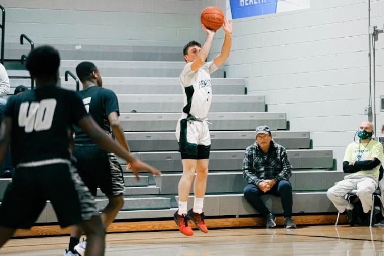 Gannon Perlini shooting a three-pointer for Pennridge High.
